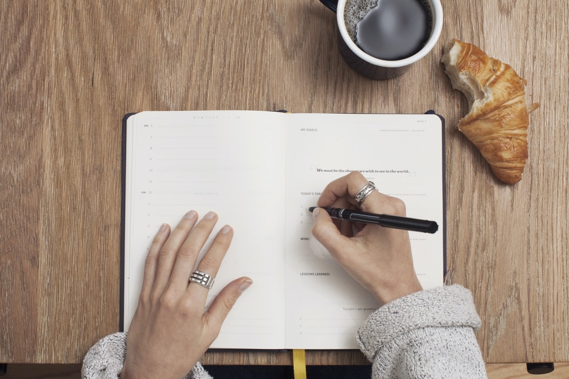 Person taking a coffee break. Caption: Taking breaks will help you avoid burnout.