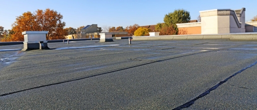 Hoe lang gaat een plat dak mee?