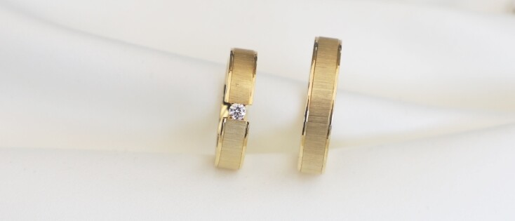 Trouwringen met diamant: tijdloze schittering voor jullie liefde