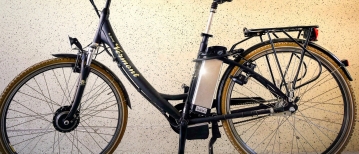 Je e-bike veilig opladen in een tuinkast | Hardhoutentuinkast.nl