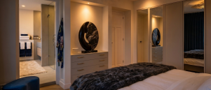 De master suite ontwerpen: slaapkamer, badkamer en kleedkamer als één verblijf