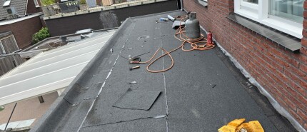 Bitumen randafwerking: metalen strip of liquid rubber?