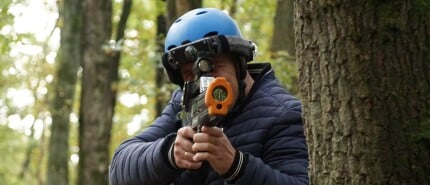 Betovering van lasergamen in het bos