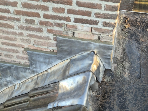 Repareren schoorsteen lood vervangen
