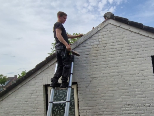 Schoorsteen verwijderen en muur terug metselen