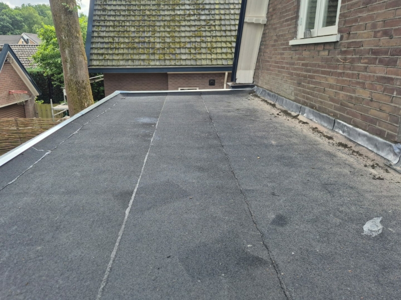 Plat dak bitumen overlagen