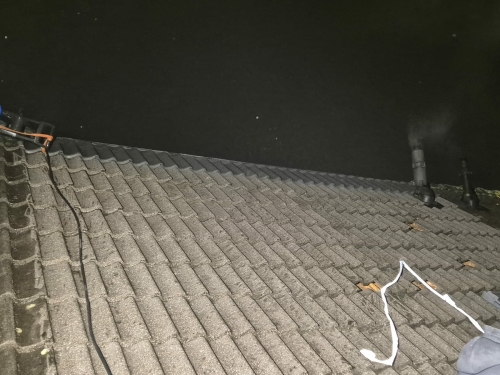 Betonnen dakpannen reinigen