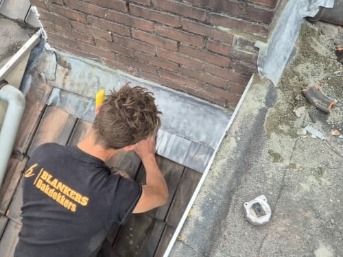 Schoorsteen renoveren loodwerk