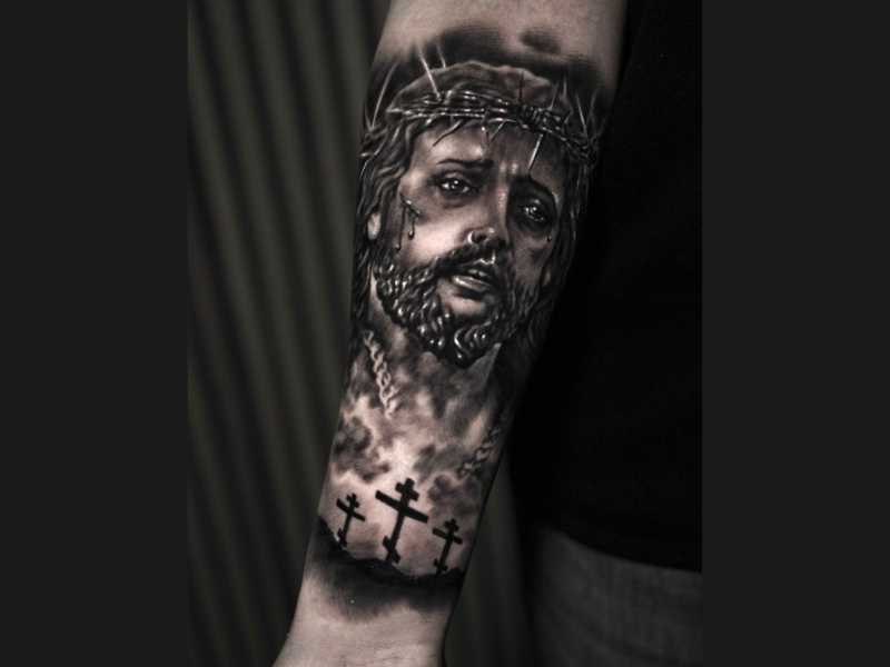 Realisme tattoo van jezus en het kruis