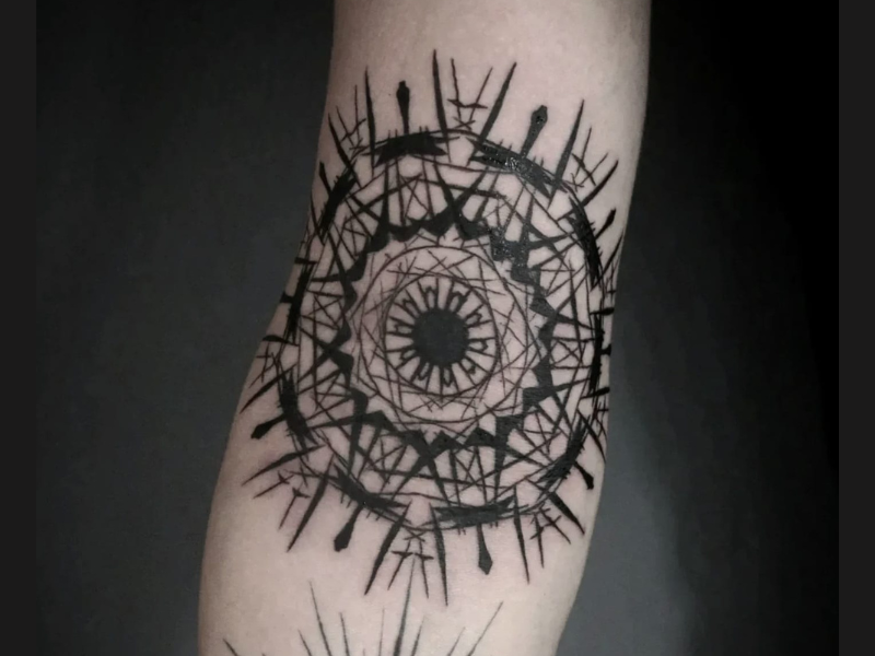 Mandala blackwork tattoo