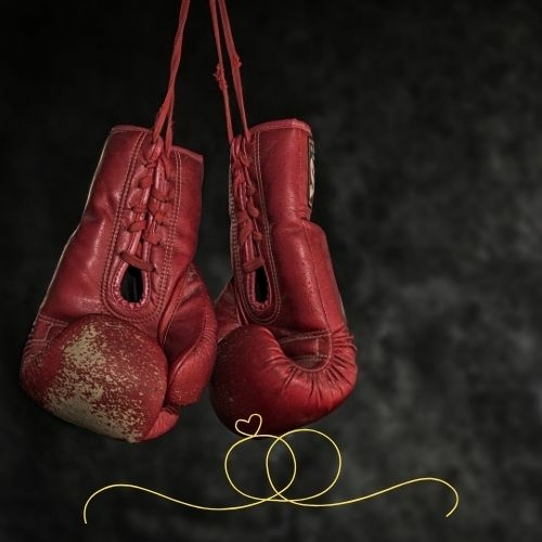 Bokshandschoenen voor relatietherapie met boksen