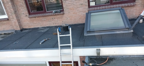Bitumen dakbedekking leggen plat dak