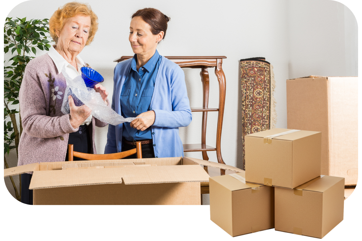 senioren verhuizen met verhuisdozen op de voorgrond