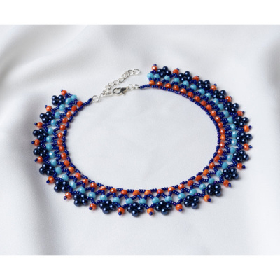 Beadwork threading pattern necklage in blue and orange