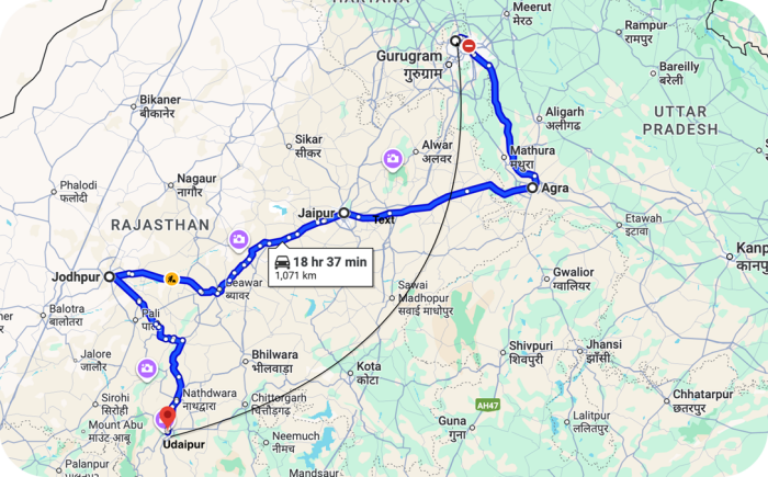 Deze afbeelding toont een geplande route in de Indiase staat Rajasthan, waarbij steden als Udaipur, Jodhpur, Jaipur en Agra worden aangedaan.