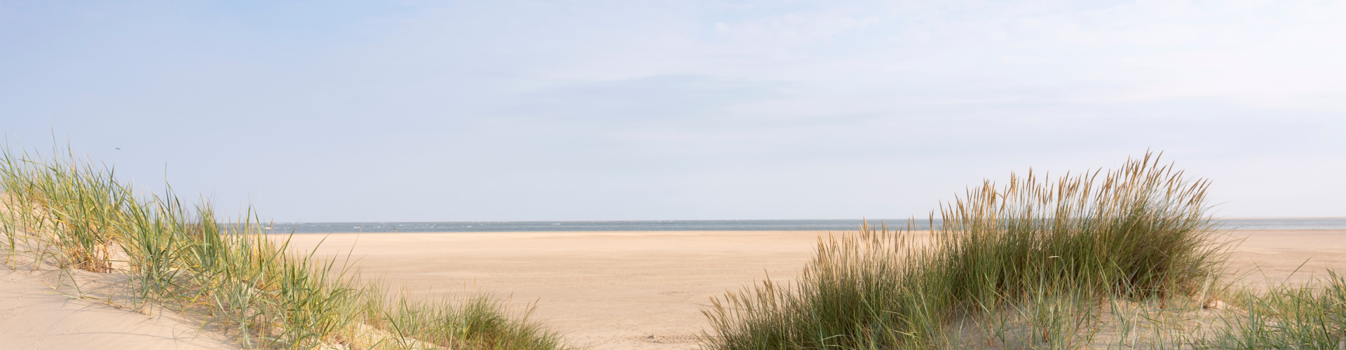 Duinen met doorkijk naar het strand in Schoorl – Verdiepingsdag voor vrouwen die altijd maar doorgaan