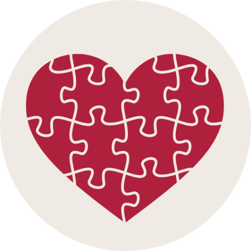 Illustratie rood hart met puzzelstukjes.