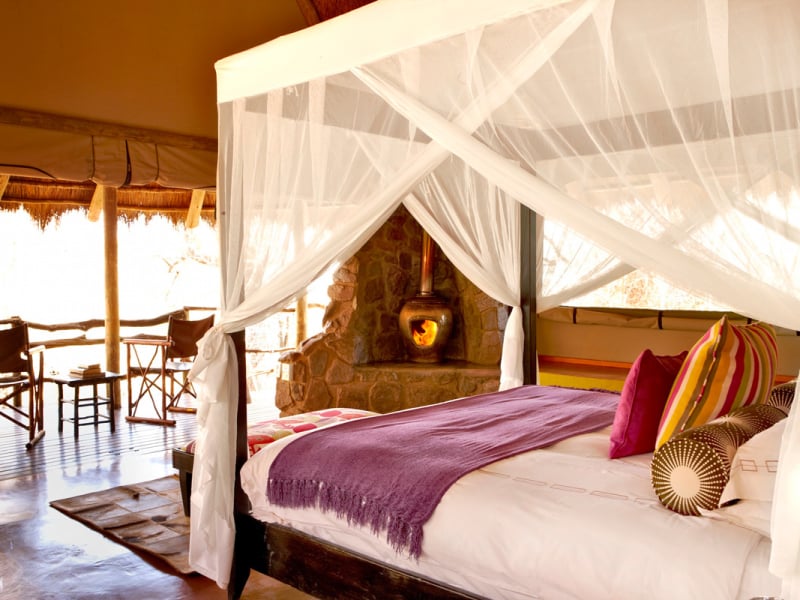 jacis-safari-lodge-madikwe-private-game-reserve-zuid-afrika-slaapkamer-met-uitzicht