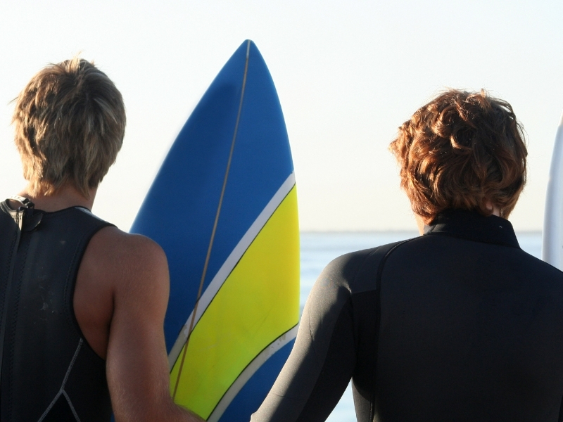 surfers-surfing-durban-south-africa