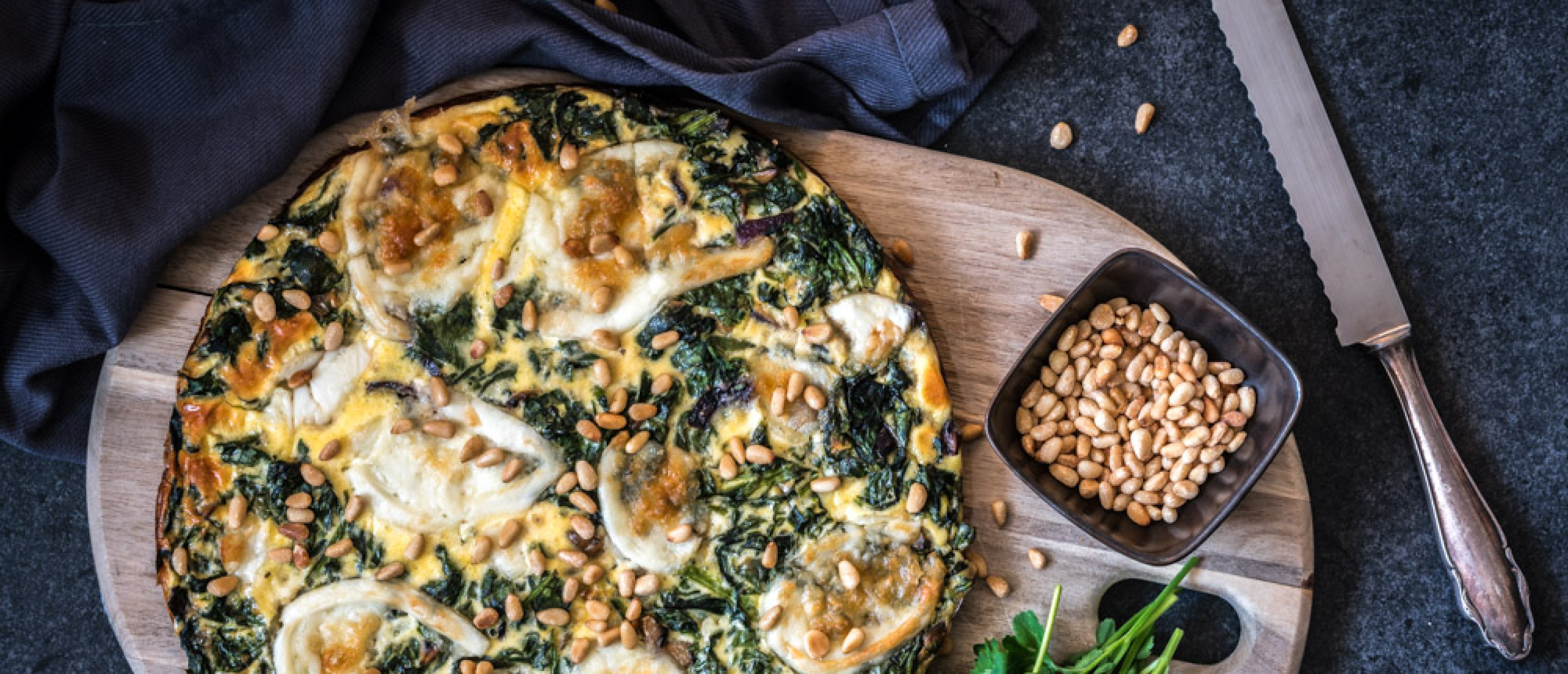Recept: Heerlijke quiche met spinazie, mozzarella en champignons