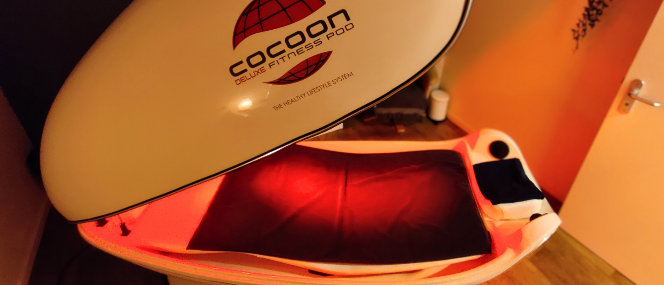 Wat maakt de trillingsmassage van de Cocoon Wellness Pro Pod uniek voor ontspanning en pijnbestrijding?