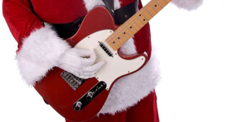 Kerstliedjes op gitaar leren spelen