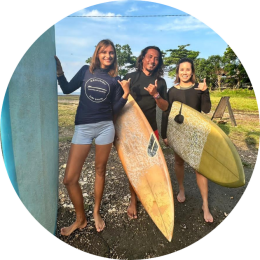 surfers relaxing at Kedungu beach during sunset Bali