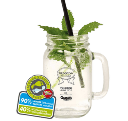 Een glas duurzame Grapos limonade Een mason jar gevuld met duurzame Grapos limonade