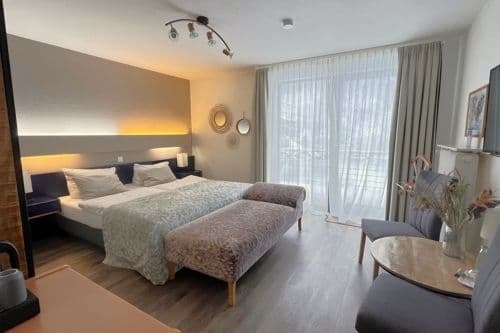 Comfortabele tweepersoonskamer bij boutique hotel Harz hotel Iris