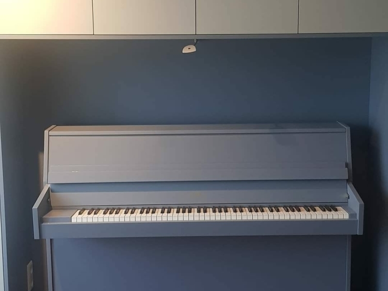 Piano laten spuiten grijs