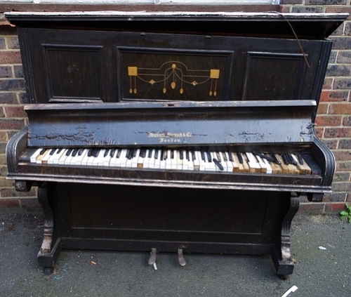 Afvoeren oude piano