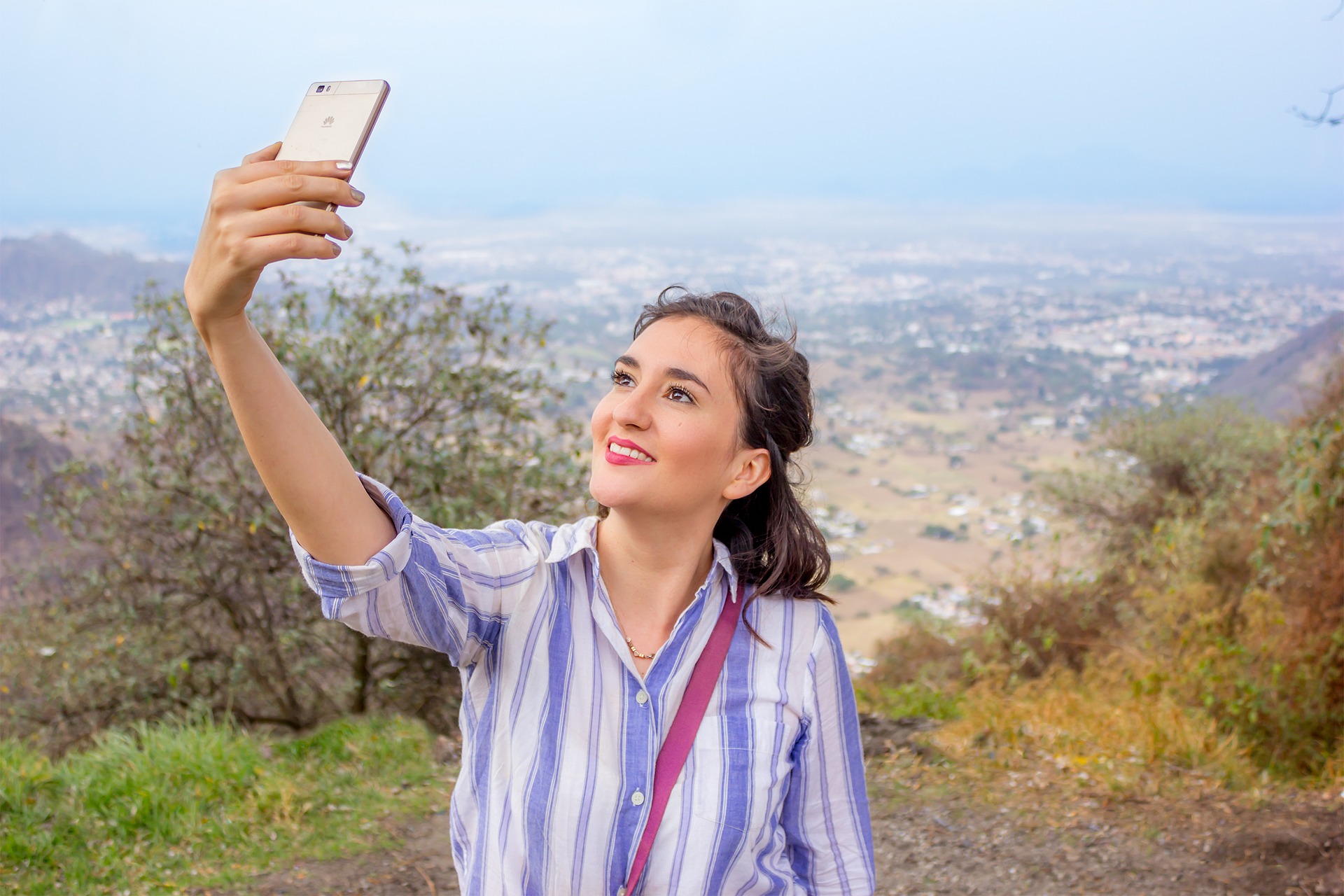 Hoe maak je de mooiste en leukste selfie voor in je fotoboek?