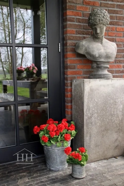 Kunst geranium rode kunstplant styling in zinken emmer