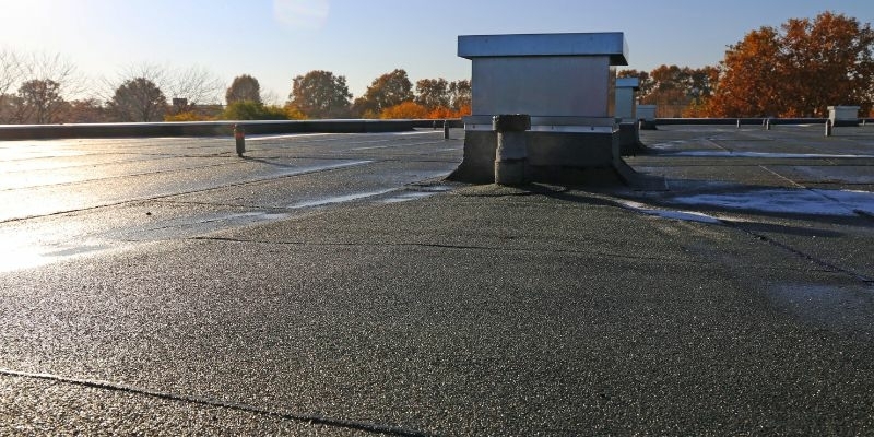 Plat dak laten isoleren aan buitenzijde