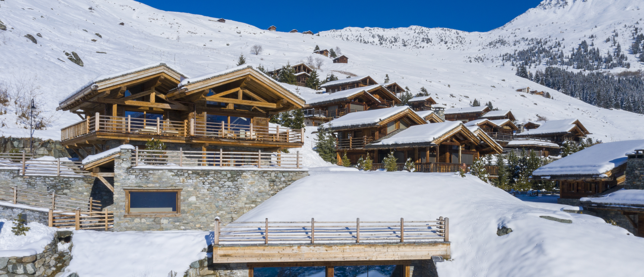 Winter Wonderland in de Alpen: ontdek deze luxe skichalets in Frankrijk, Zwitserland of Oostenrijk