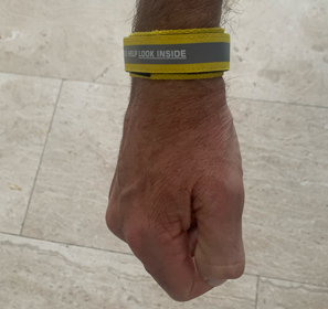 SOS-armband geel