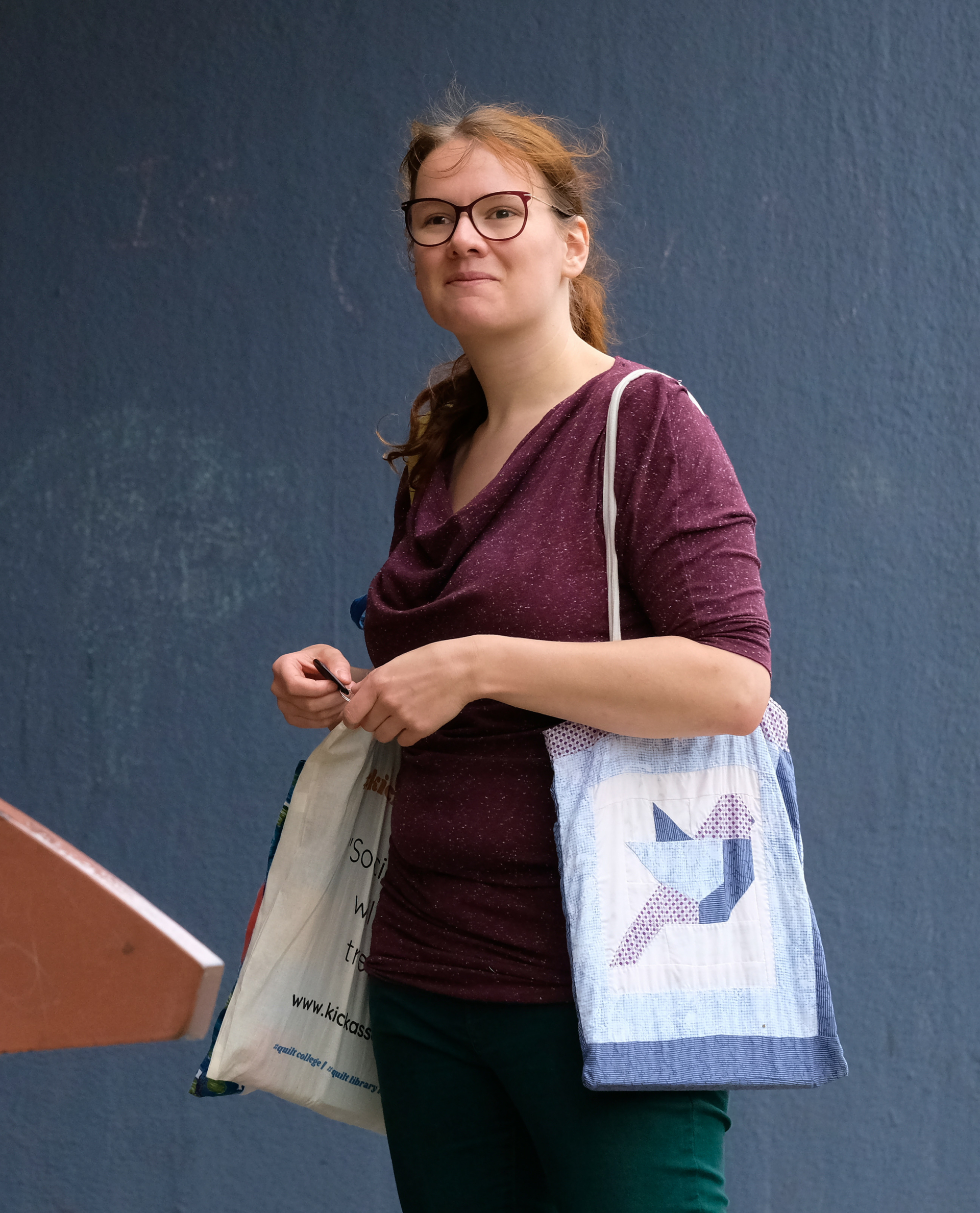 Rianne, teacher & Founder KIck Ass Quilts with 2 quilted bags