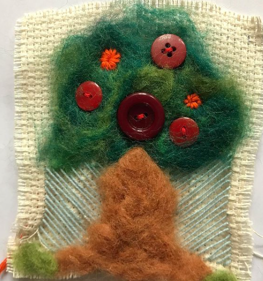 Little blanket made with felt and buttons by a primary school student