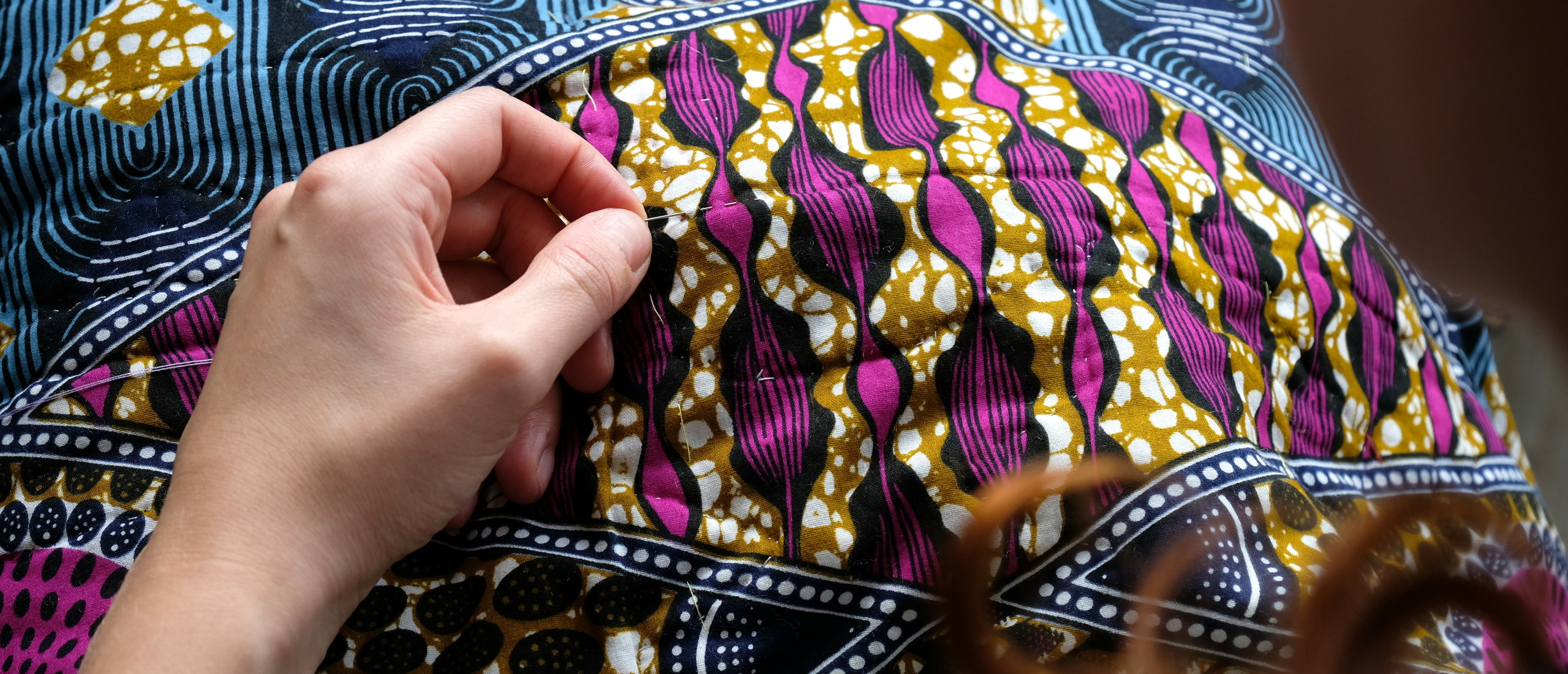 hand quilting the kenyan quilt