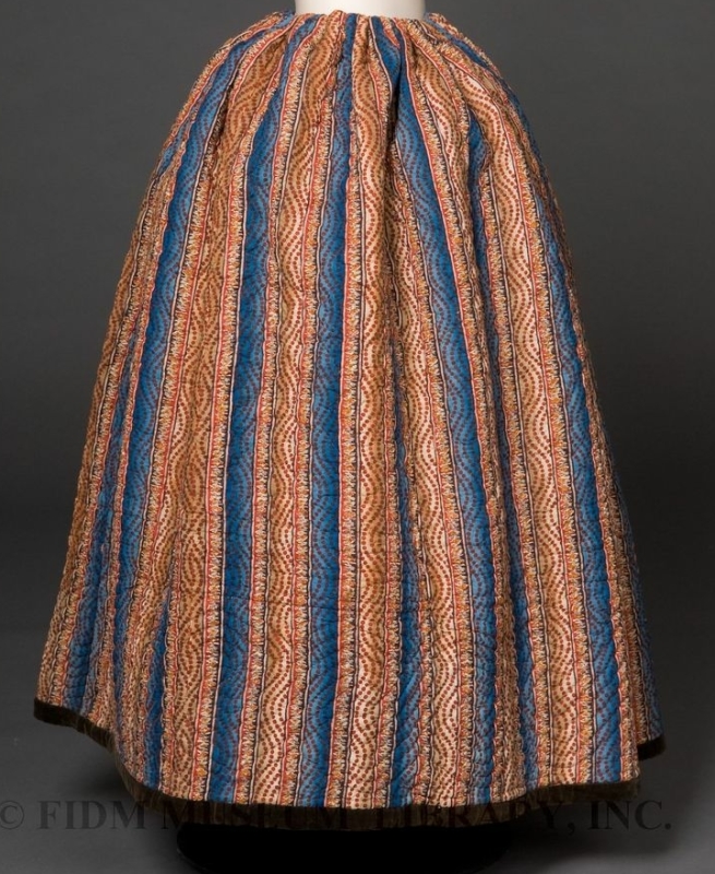 Quilted petticoat in orange and blue fabrics- Gift of Anna Bing Arnold FIDM Museum collection