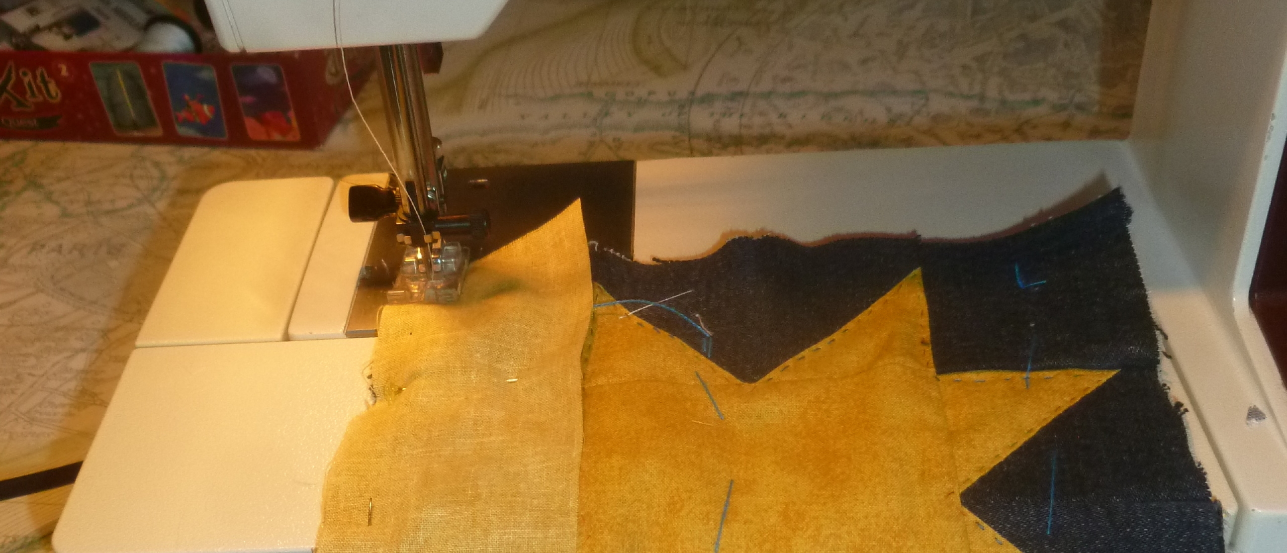 Pfaff sewing machine attaching a border to a mini quilt potholder