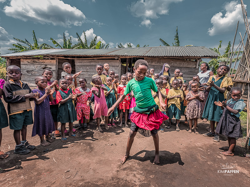 Dancing children at rural school near Kibale