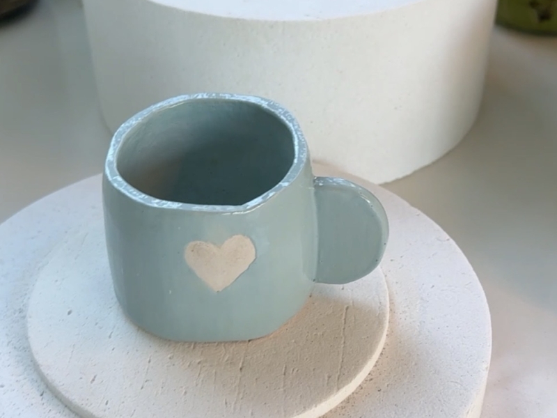 esprresso tasje in licht blauw met een hartje