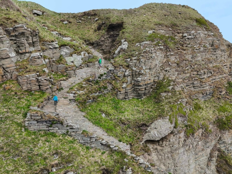Whaligoe Steps, Caithness sea cliffs drone shot