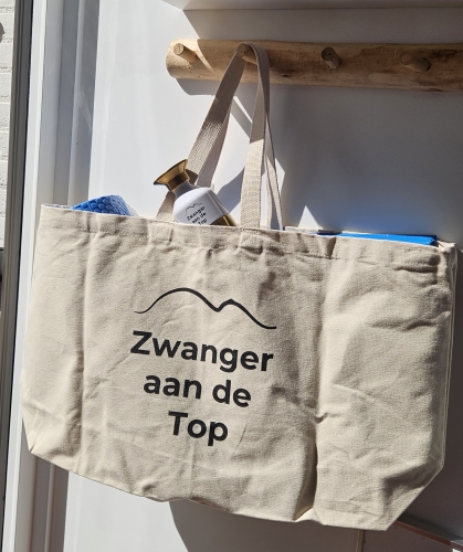 Zwanger aan de top tas