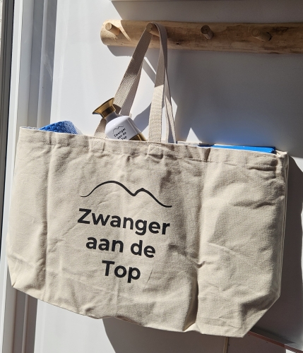 Zwanger aan de top tas