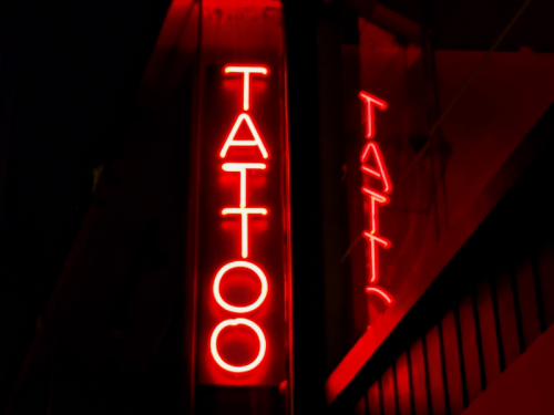 Red tattoo sign