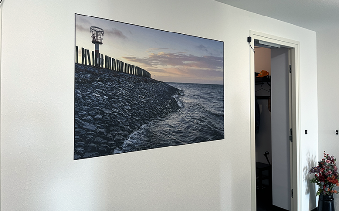 Wallprint met natuurbeeld in de hal van een appartementencomplex