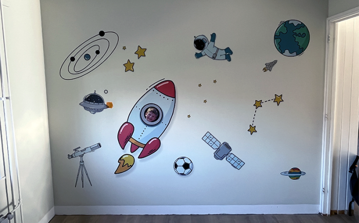 Wallprint met astronauten en planeten in jongenskamer Lichtenvoorde