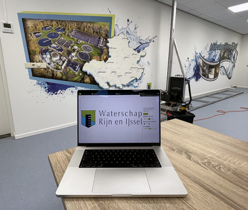Wandvisual met uitleg over waterbeheer in waterzuivering Etten